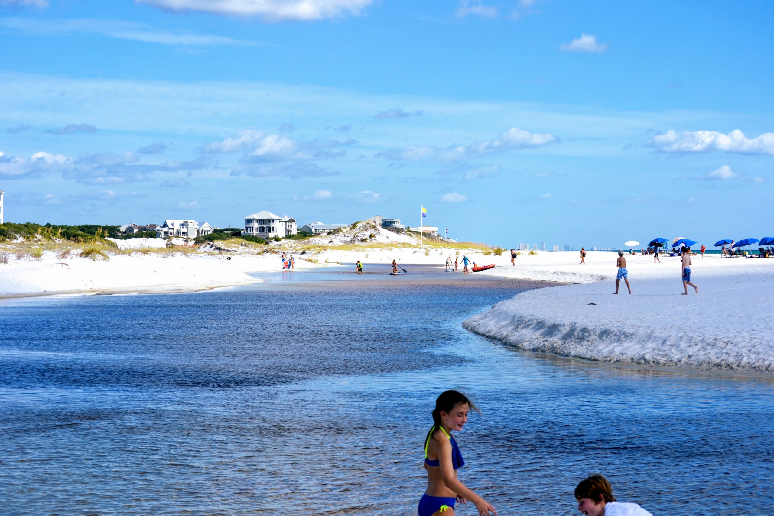 A coastal dune lake meeting the Gulf at WaterSound Beach