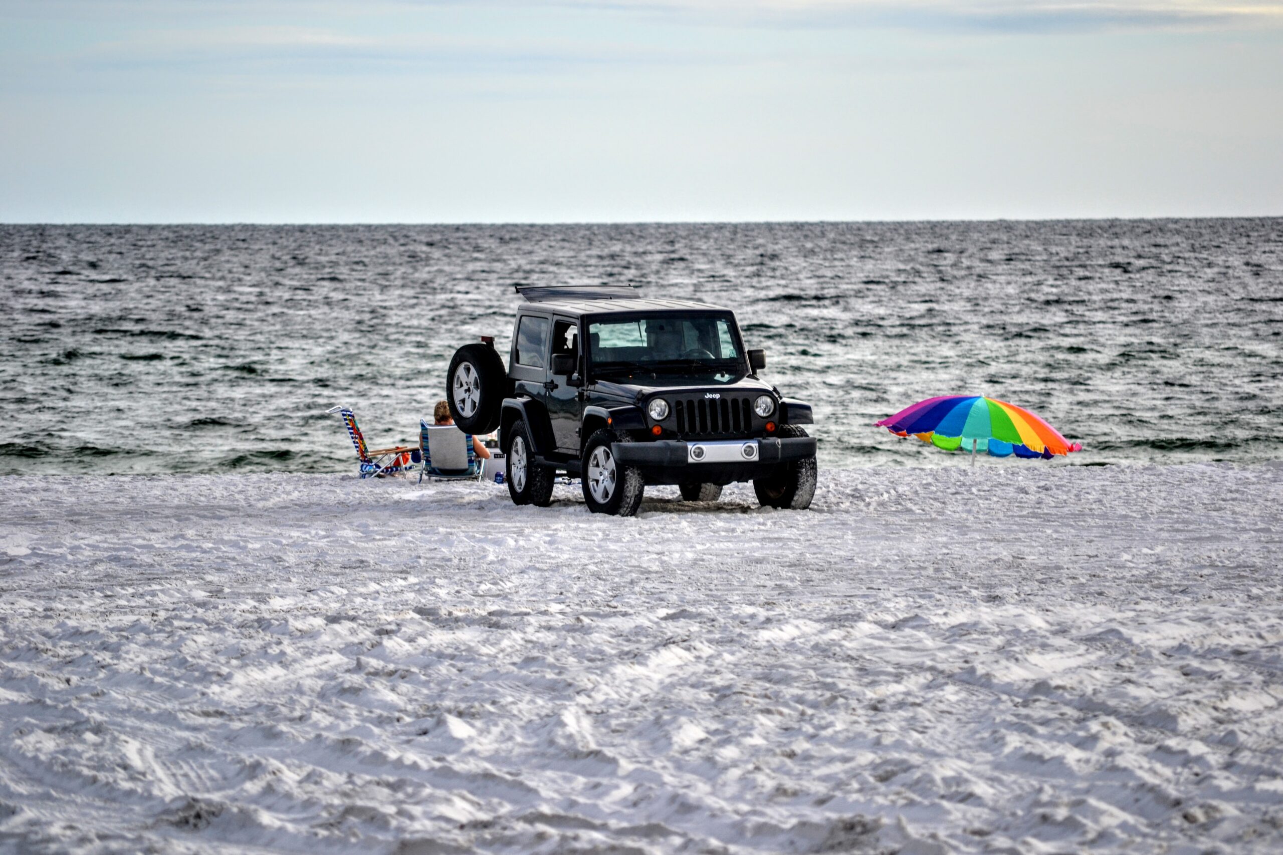 A Jeep on the white sand at Grayton Beach, Florida