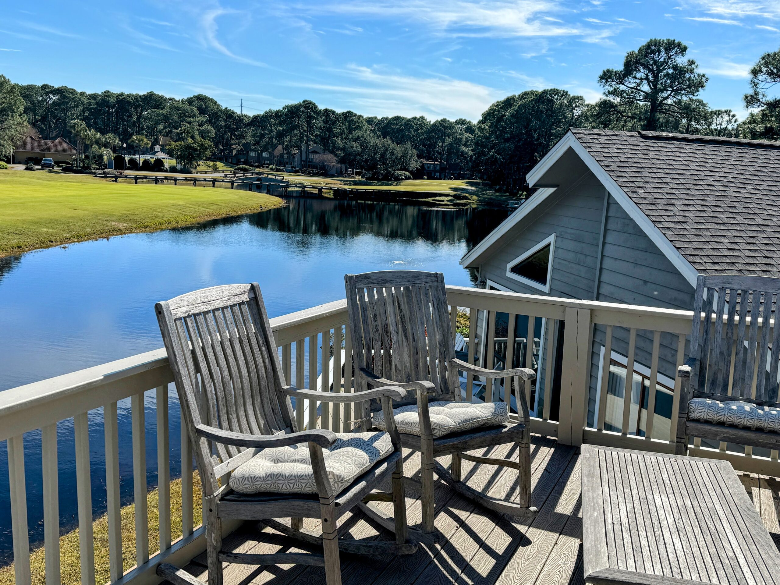 Home balcony golf course view sandestin sunny day mid day