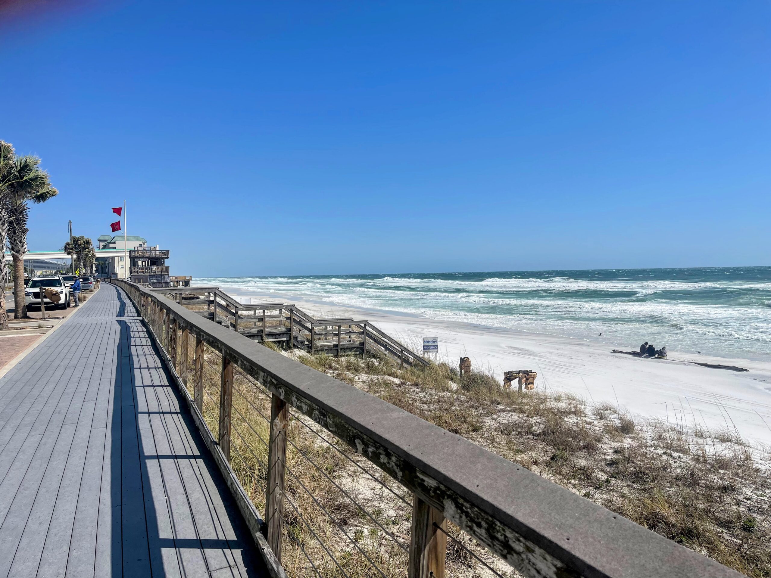 Miramar Beach, Sunny, Windy, high surf, Gulf Image from the board walk Mid day. Looking East