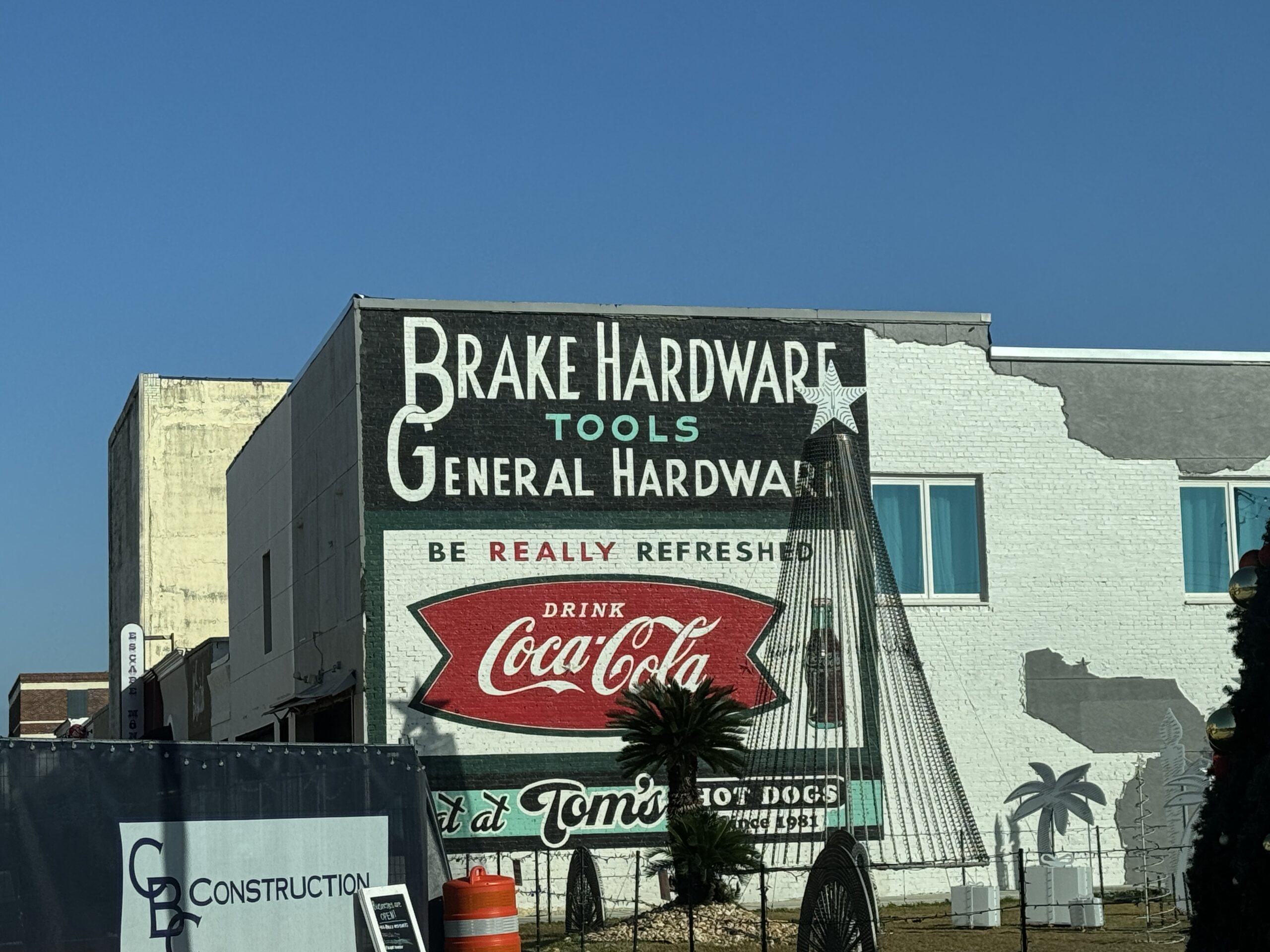 Restored Brake Hardware and Coca-Cola ghost sign on a brick building in downtown Panama City