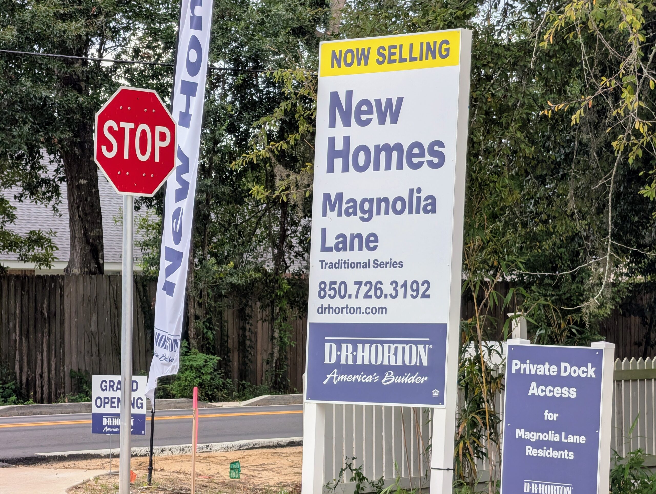 A D.R. Horton New Homes Now Selling sign at the entrance to a community
